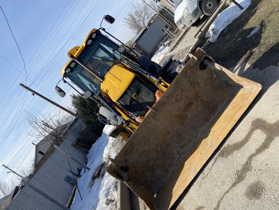 Эксковатор погрузчик 3/1 Гидромолот Яма бур