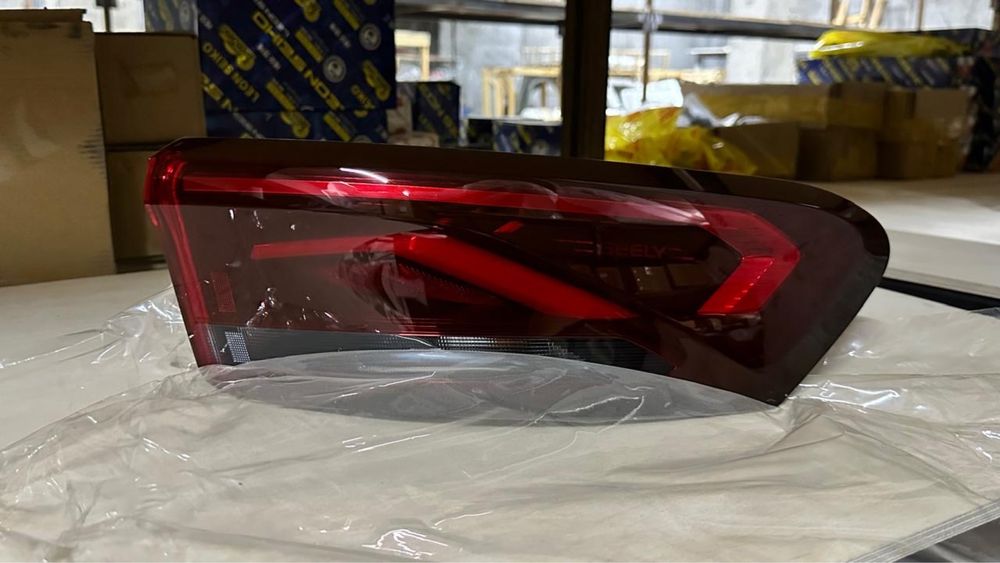 Geely Emgrand  фары оптика