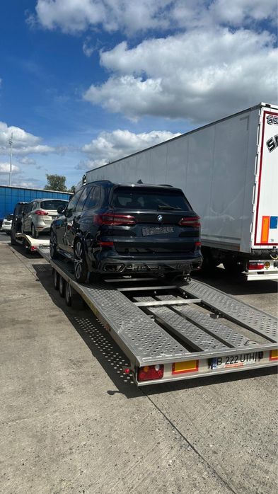 Transport/tractari auto cu platforma Germania, Olanda, Belgia, Romania