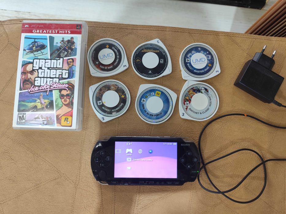 PSP Sony 1004   , зарядно,7 игри.