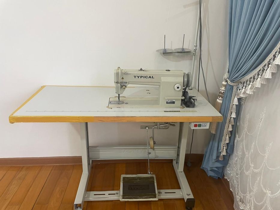 Швейная машина .