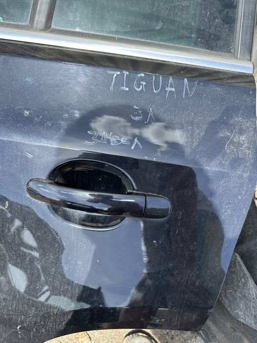 Задна лява врата Vw Tiguan 2008-14год с лека забележка
