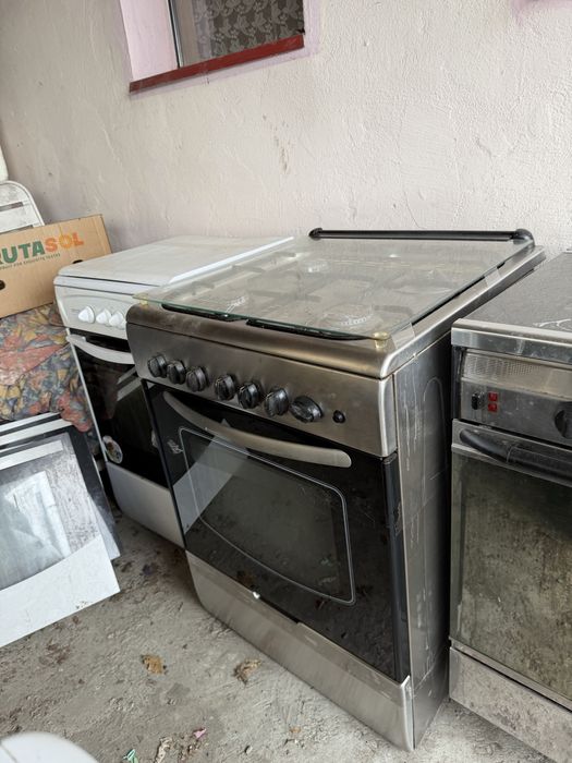 Vand aragaz de inox cu patru ochiuri