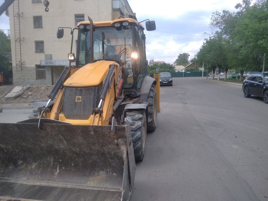 Услуги экскаватора эксковатора погрузчика