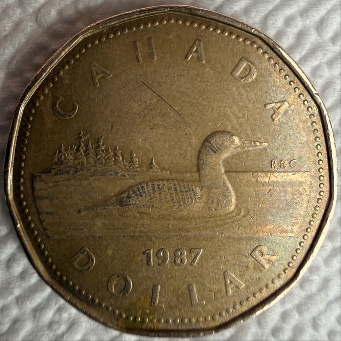 (“Loonie”), anul 1987 — prima ediție loonie.