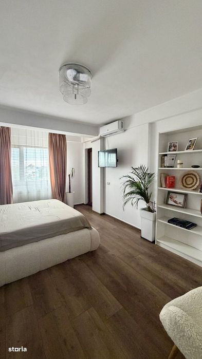 Apartament cu 2 camere, loc de parcare, curte cu loc de joacă, foișor