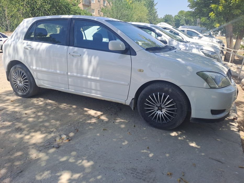 Тайота королла 2002