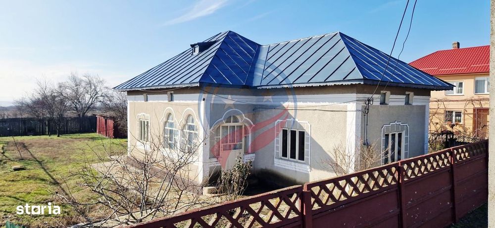 Casa Bradesti  teren  intravilan 7952 mp  deschidere 33 m la DE 70