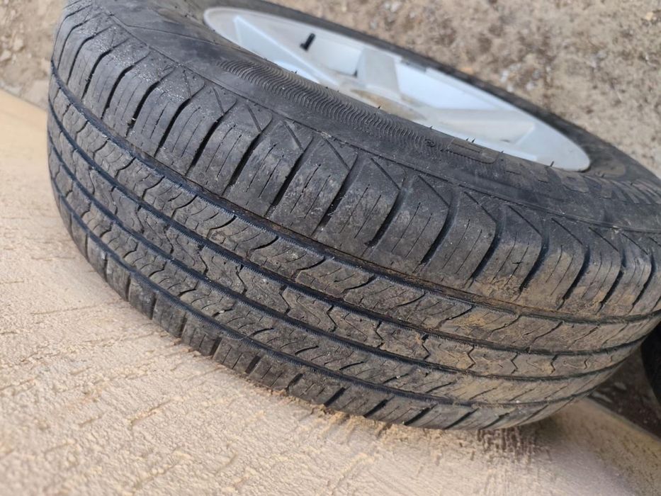 Продам титановые диски с резиной