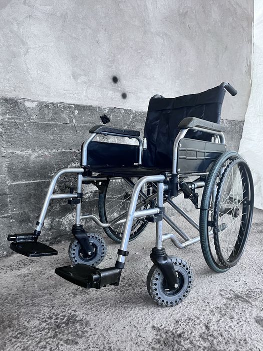 Коляска для инвалидных
