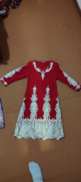 Kiyimlar yangi va 1 . 2 marta kiyilgan