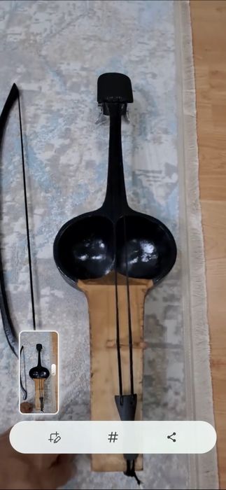 Қылқобыз  футлярымен бірге