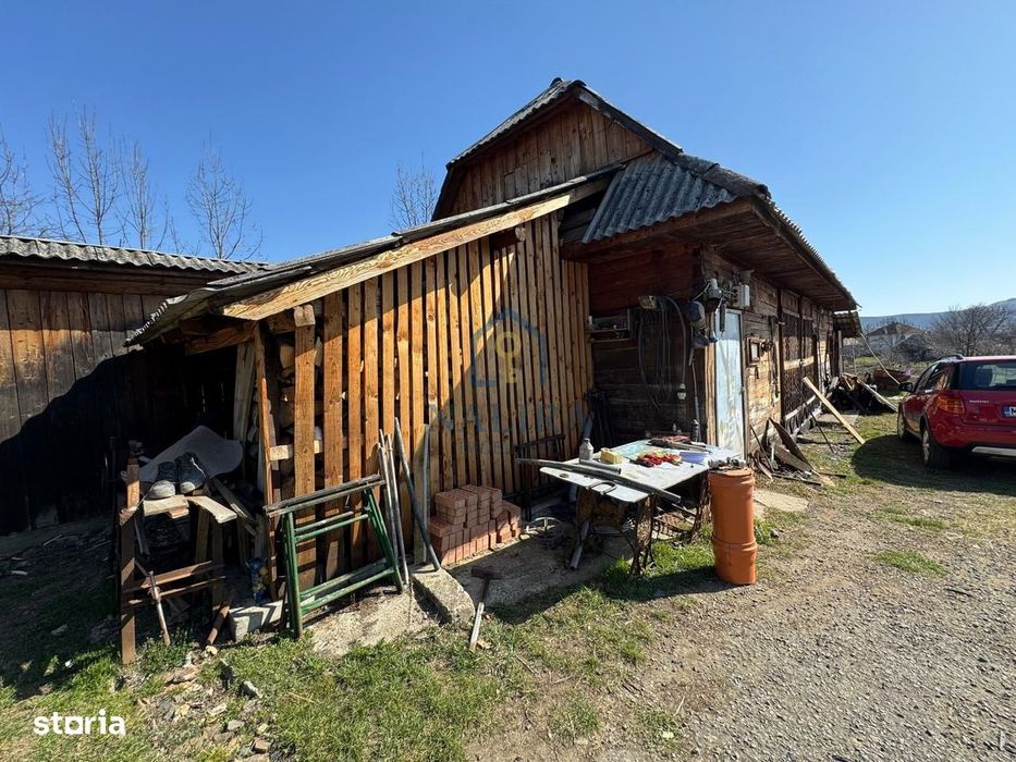 Casa de caramida de vanzare Surdesti cu teren intravilan 5000mp