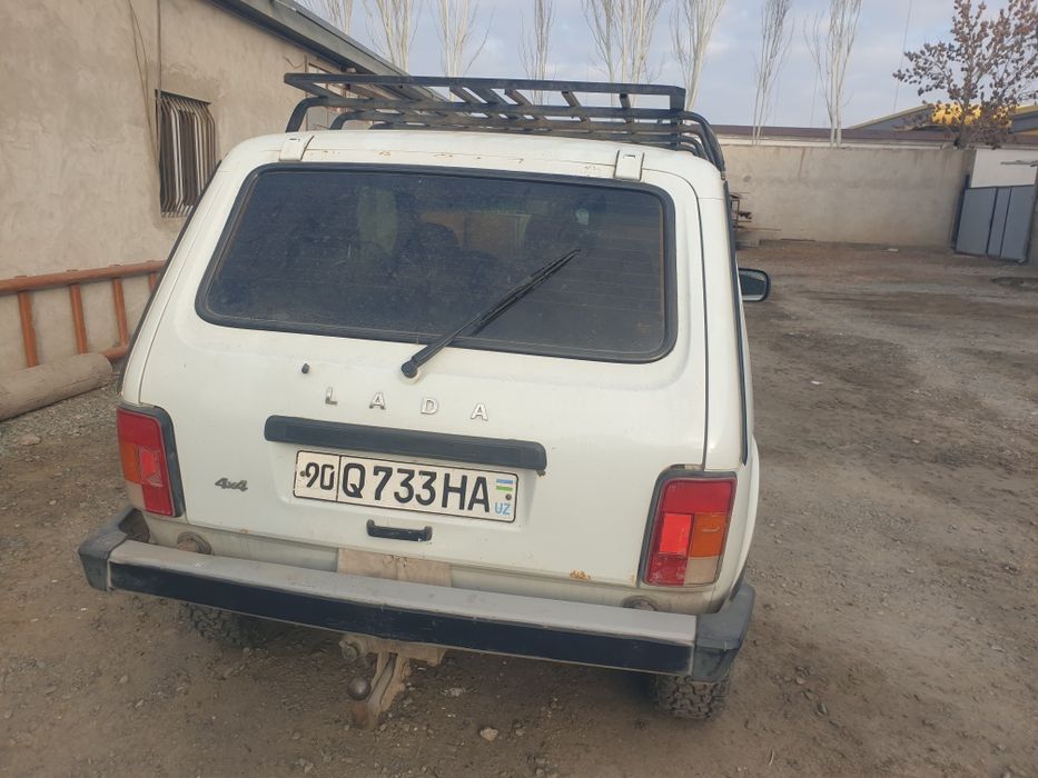 Урганчда НИВА ( Lada 4x4)автомашинаси сотилади.