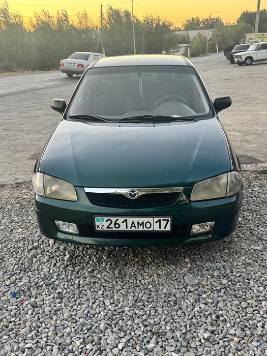 Машина мазда 323 F