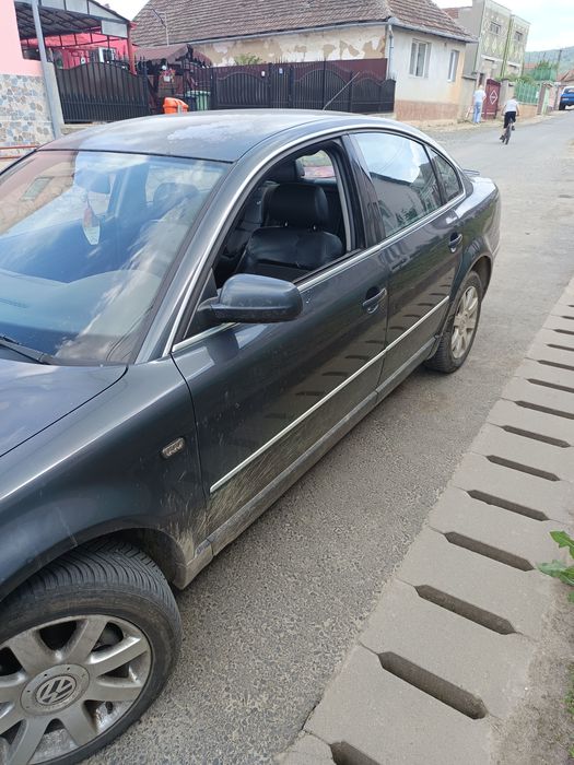 Wolsvagen passat an 2003   de 131 cai avf clima funcțională ancalzire an scaune direcție făcută noua preț 1500 €