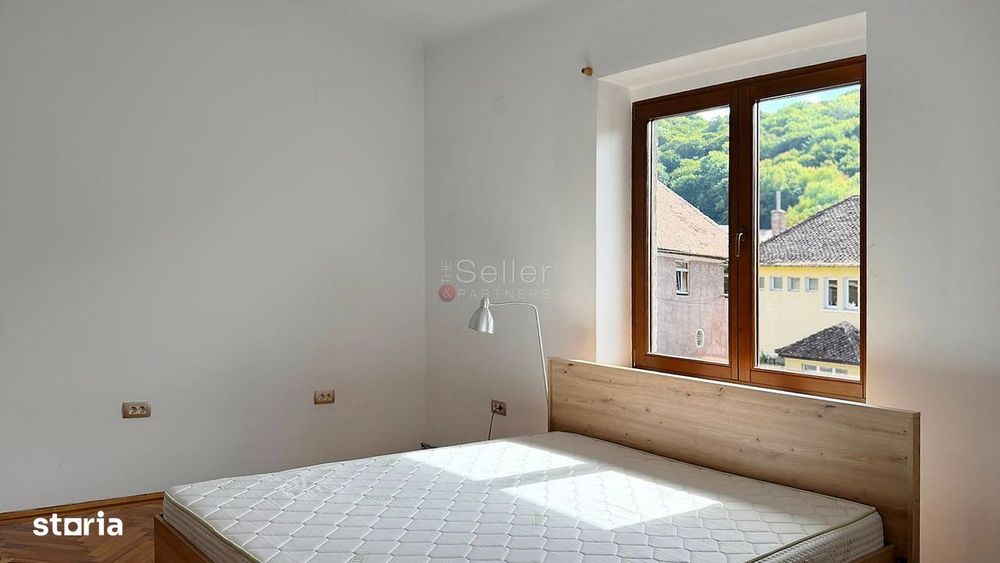Apartament cu Acces la Curte Garaj Inclus