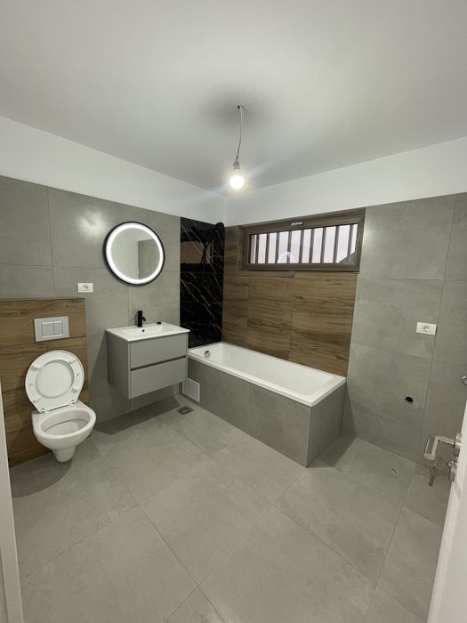 Apartamente cu două camere finalizate , grădină  proprie si parcare