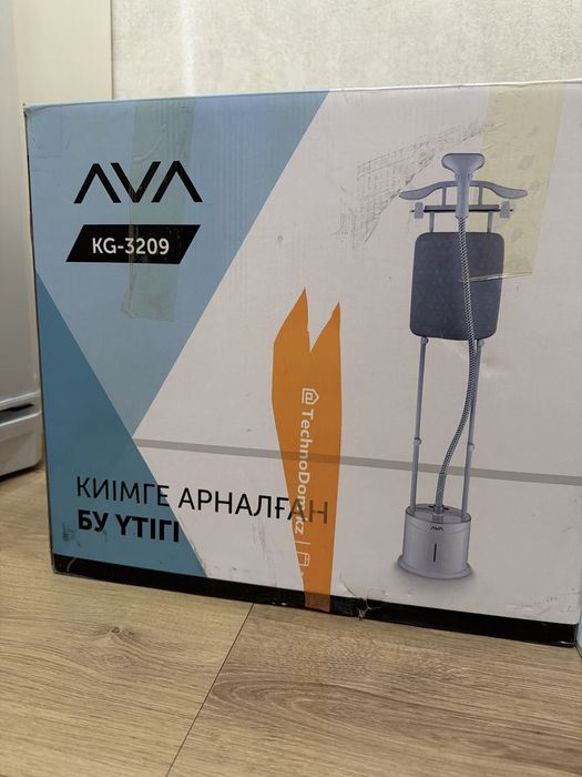 Отпариватель для одежды (паровой утюг)