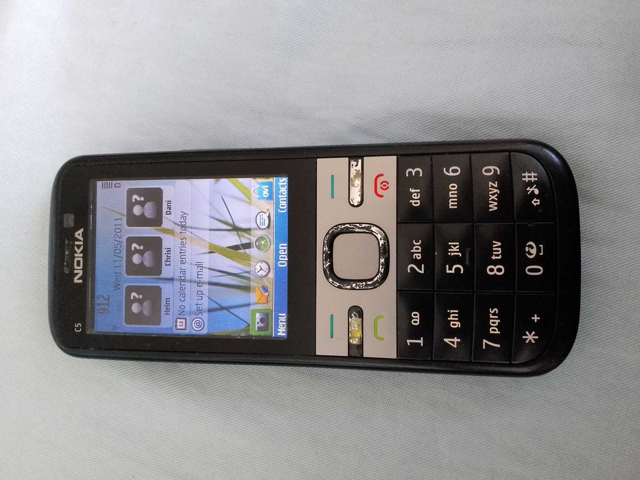 Nokia C5-00 (отключен) + зарядно