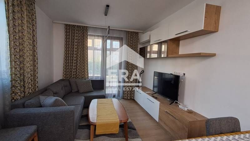 Двустаен обзаведен апартамент за продажба, със собствен двор/веранда,