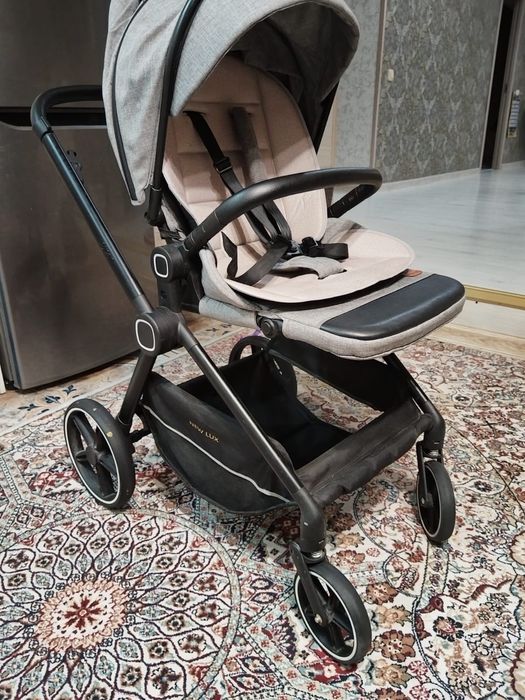 Продам коляску и стул.