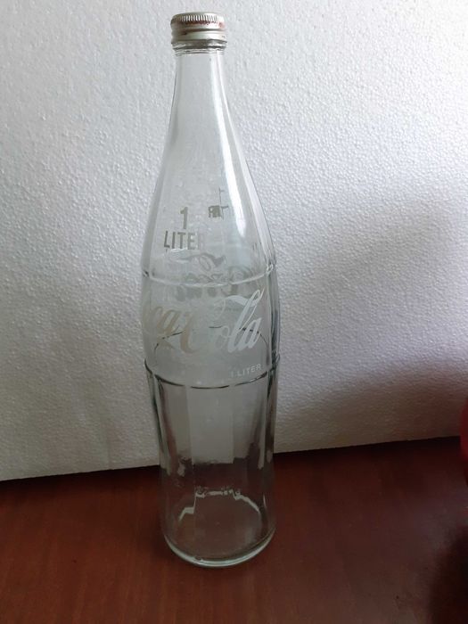 Стари бутилки от Кока-кола, безалкохолно и бренди