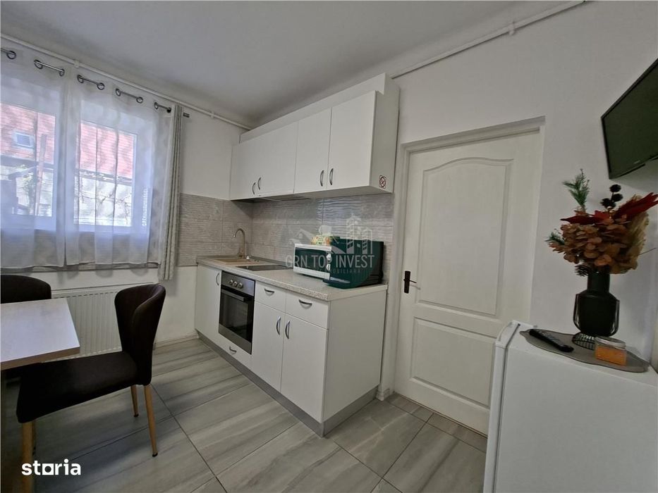 Studio curte proprie 150 mp la casa zona Centrala
