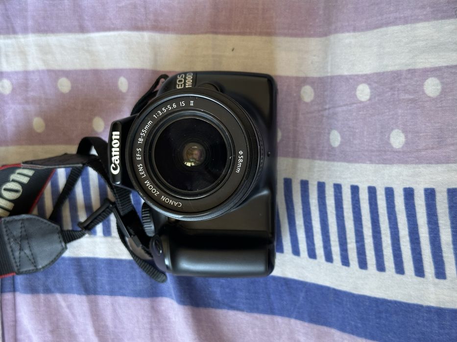 Canon EOS 1100D / DS126291 — идеальное состояние