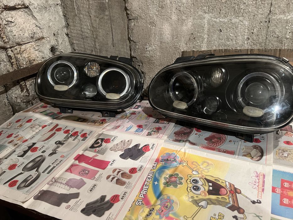 Faruri Volkswagen Golf 4 Hella cu lupă + faruri modificate