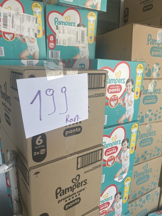 Firma vinde scutece Pampers si Huggies ,produse noi cu factura