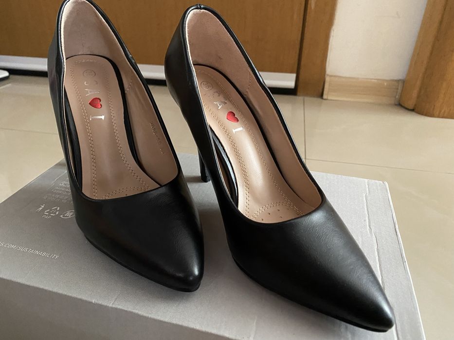 Обувки на висок ток