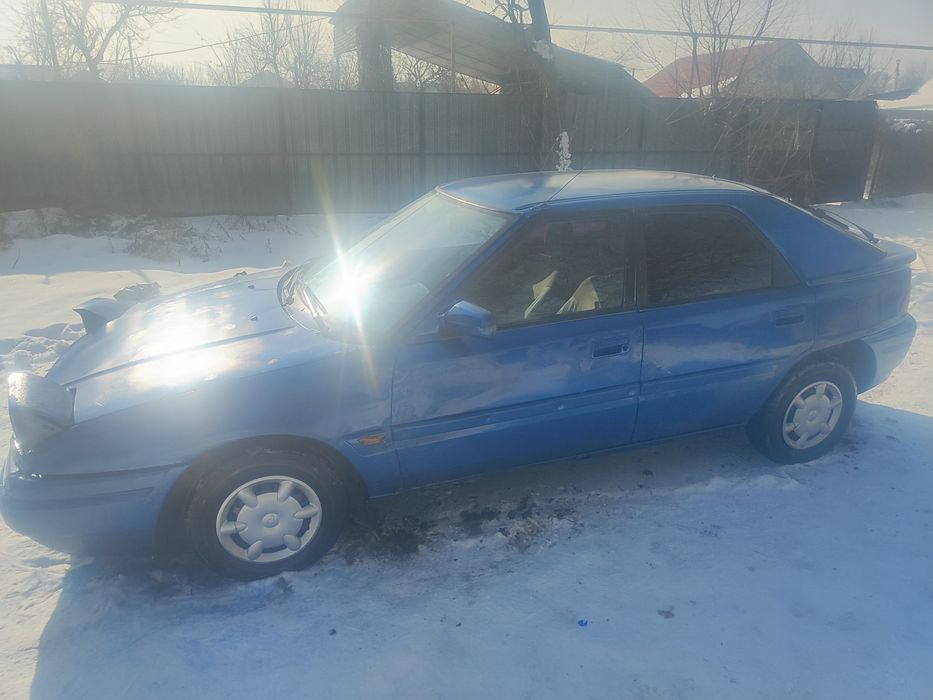 Мазда 323 продам