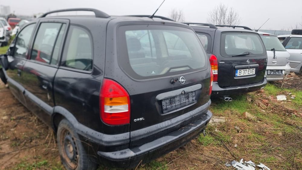 Opel zafira portbagaj usi usa stopuri bara aripa lonjeron electromotor hayon oglinda Oglinzi alternator roti rezerva geam pompa fuzeta cutie viteze