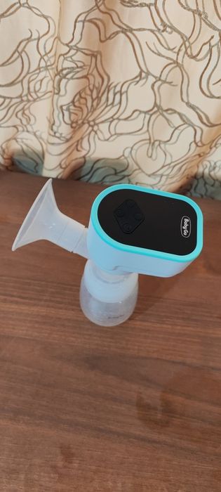 Электрический молокоотсос