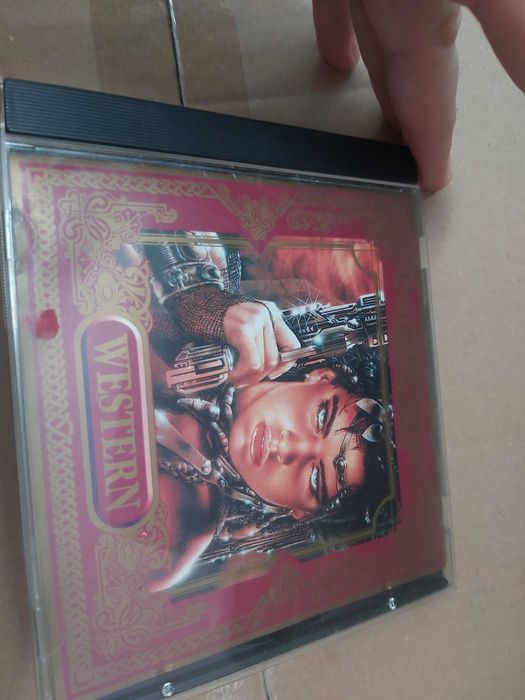 CD de Colecție „Western” - Copertă cu Ilustrație de Luis Royo