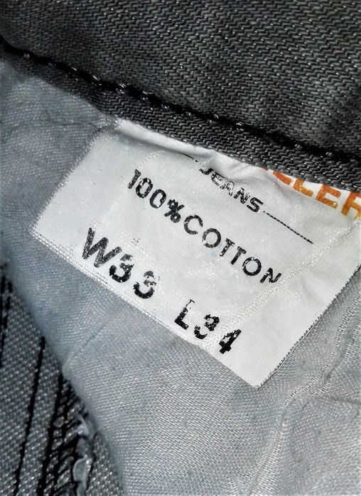 Джинсы Бело-серые. 48 размер