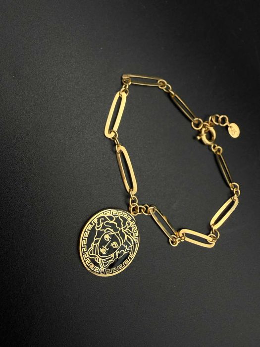 Dracula Amanet: Set Versace, Lant- 10,10gr/14k, bratara- 4.72gr/14k.