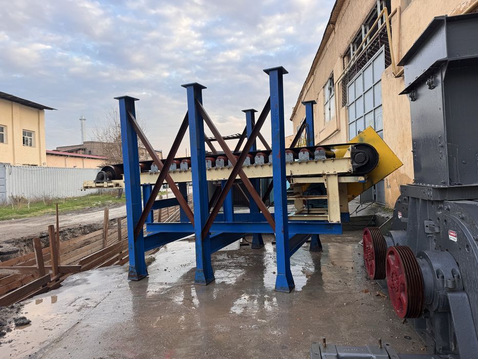 Вибропитател с конвиеаром американский