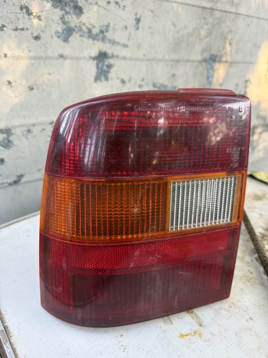Ляв заден стоп Opel Vectra A седан CARELLO 12.871.719