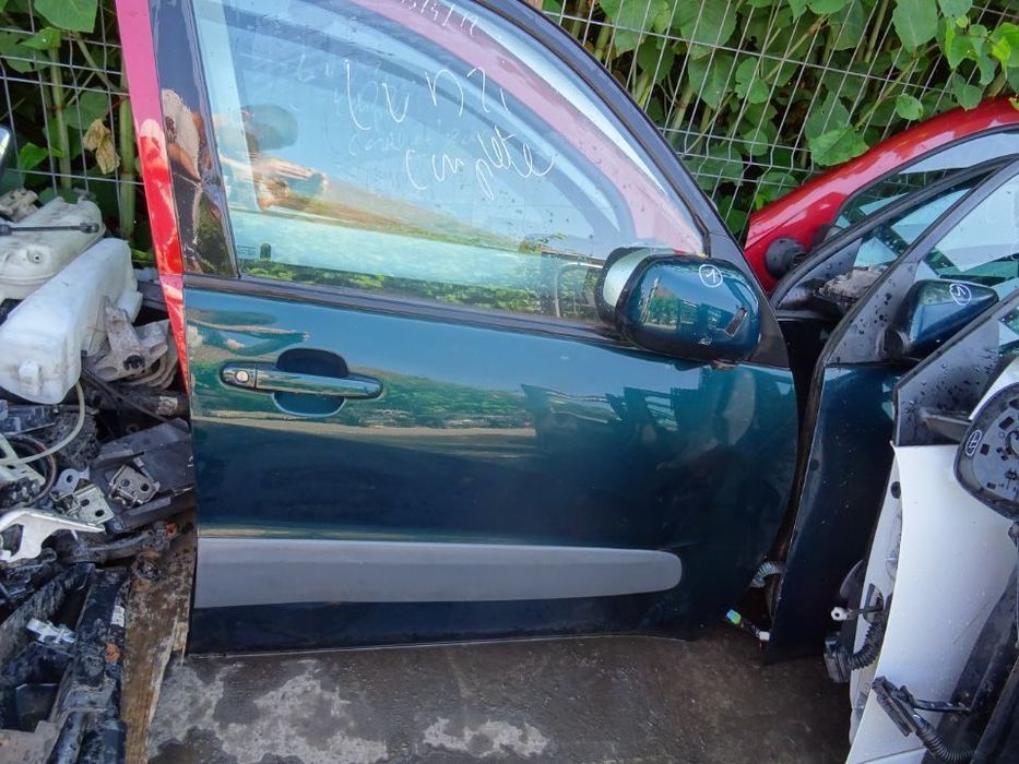 Vand Usa Fata Dreapta Toyota RAV 4 din 2005 putin lovita din 2005 volan pe stanga