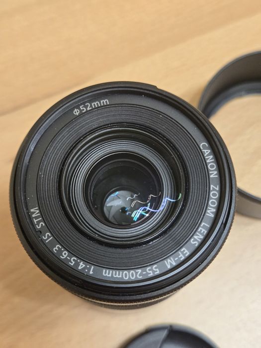 Obiectiv Canon EF-M 55-200mm ca nou cu parasolar