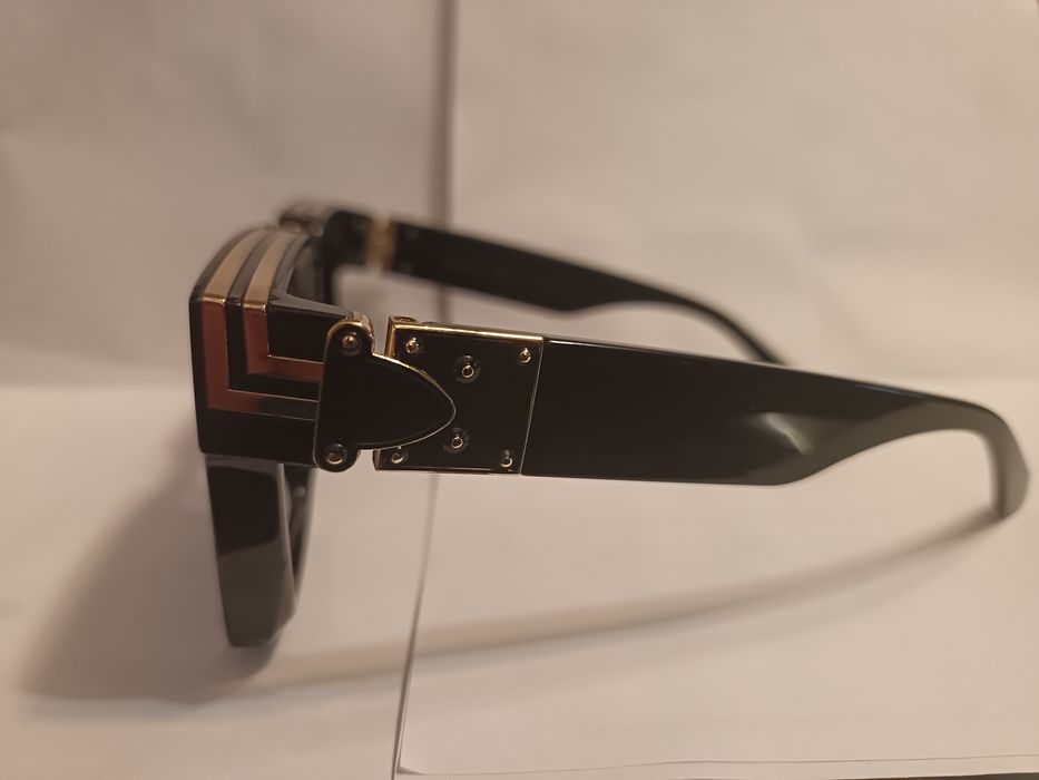 Дизайнерски слънчеви очила