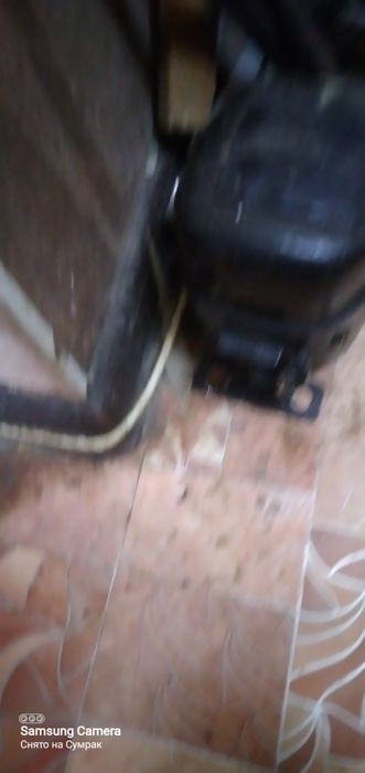 Мотор для холодильнике в рабочем состоянии