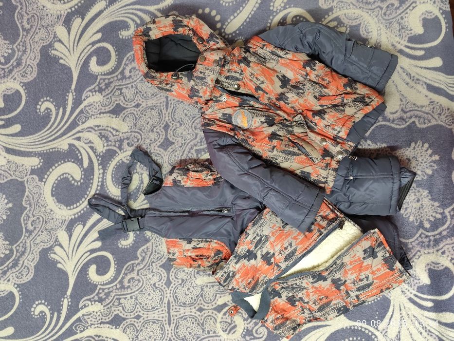 Зимний комбинезон для малыша