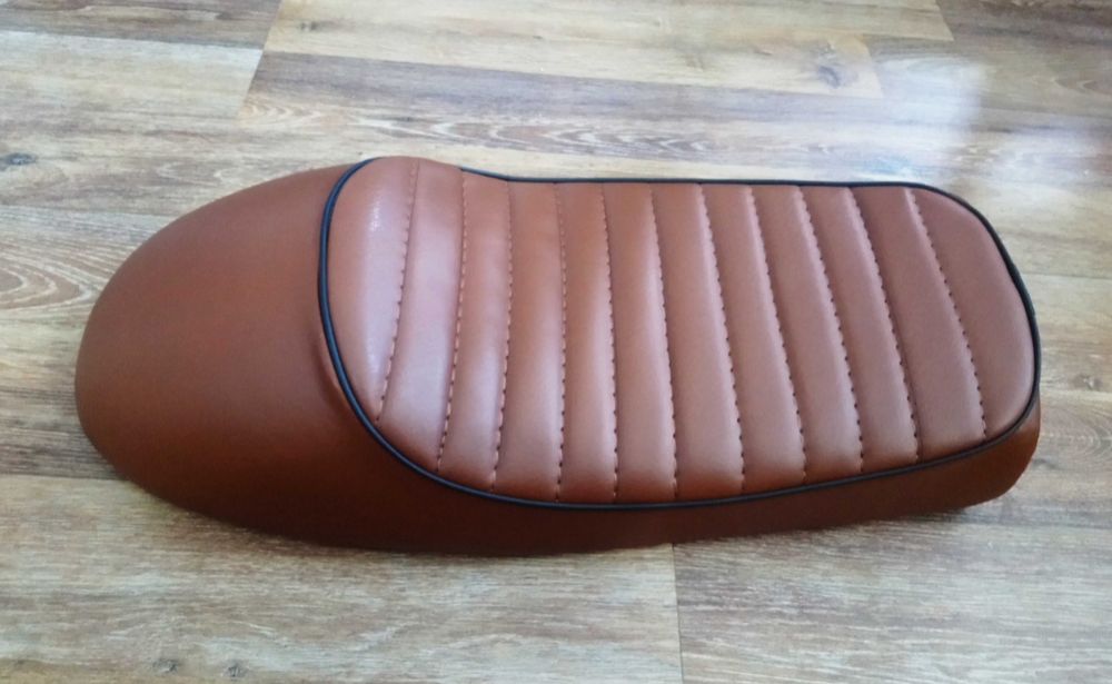 Претапициране на мото седалки