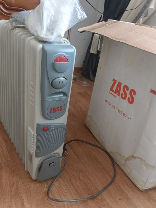 Обогреватель масляный новый