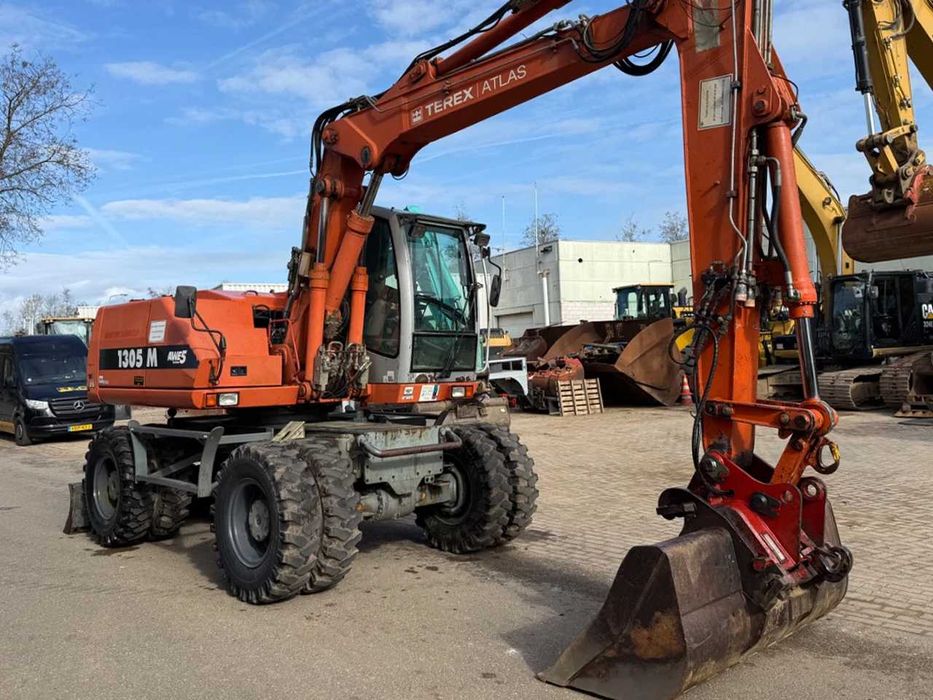 Колесные экскаватор Atlas 1305M