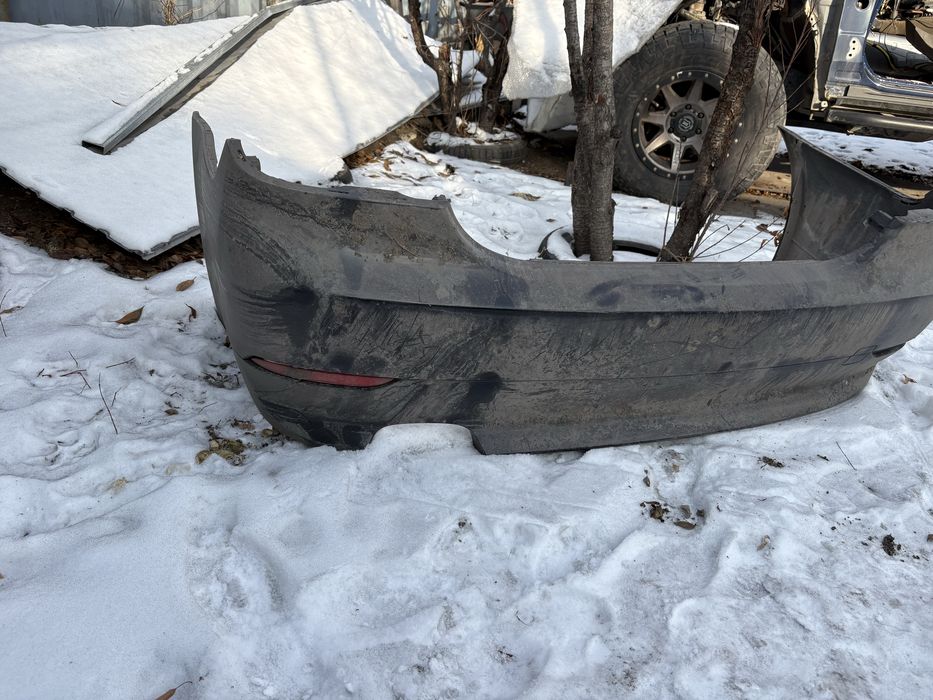 Продам. Комплект два бампера и проги BMW e 60