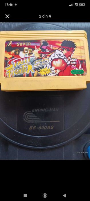 Consola retro terminator și o dischetă super street fighter